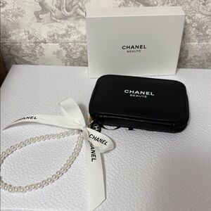 Chanel pouch with mirror.